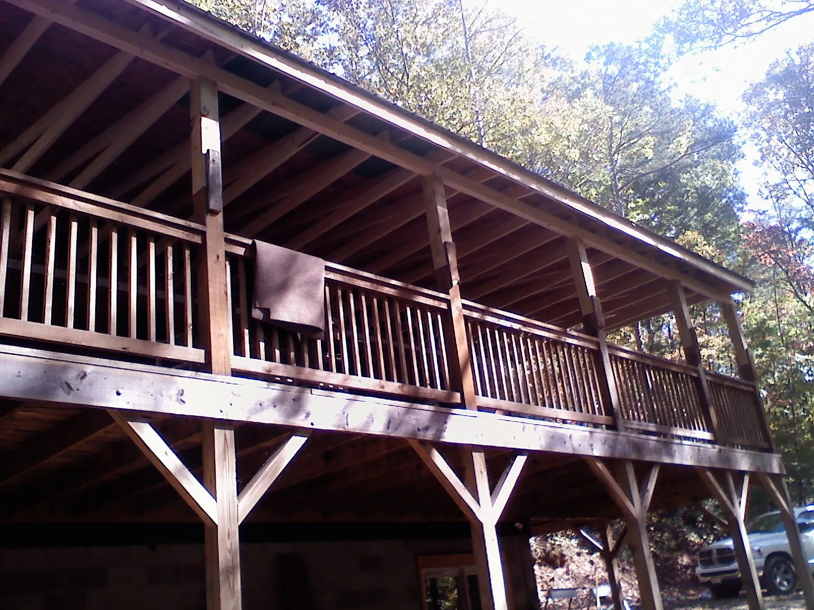 Timber framing under a new elevated porch and deck — Roof Leak Repair in Lumberton by Roofing Brothers